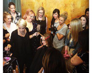 Nicole demonstrating hand painting with Wella's new Magma colors
